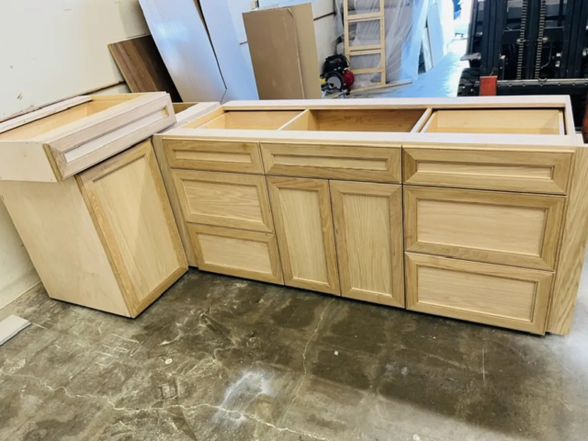 Cabinet boxes and wood fronts being assembled in the shop